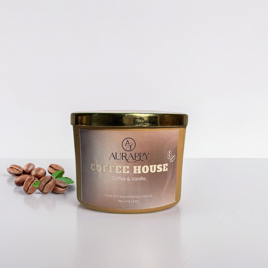 Aurappy Coffee House candle with coffee beans on a white background