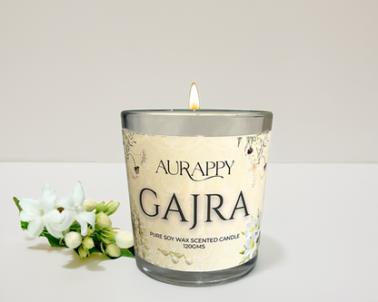 Aurappy Gajra scented candle with a white background