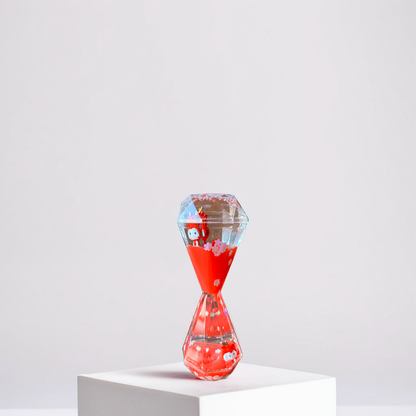 Aurappy Mesmerizing Hourglass Two Minutes Timer red color featuring soothing droplet movement, perfect for stylish home décor and elegant desk accents – buy this unique timer online; ideal as an hourglass 2 minutes time