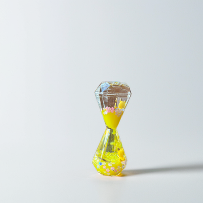 Aurappy Mesmerizing Hourglass Two Minutes Timer yellow color featuring soothing droplet movement, perfect for stylish home décor and elegant desk accents  