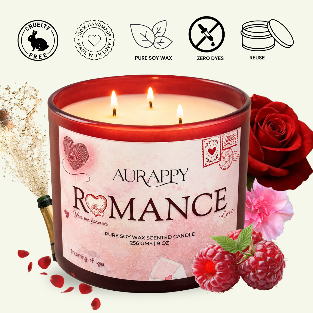 A three-wick scented candle in a red glass jar labeled Aurappy Romance, shown with decorative roses, raspberries, petals, and feature icons on a light beige background.