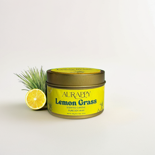 Aurappy Lemon Grass scented candle with a lemon and grass on a white background
