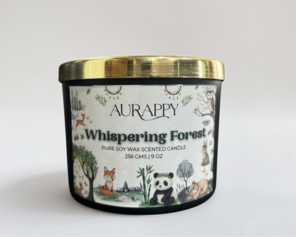 Aurappy Whispering Forest candle with a gold lid on a light gray background