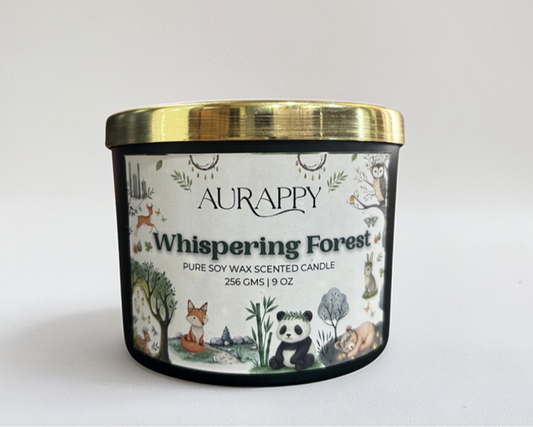 Aurappy Whispering Forest candle with a gold lid on a light gray background